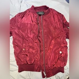 small burgundy zip up